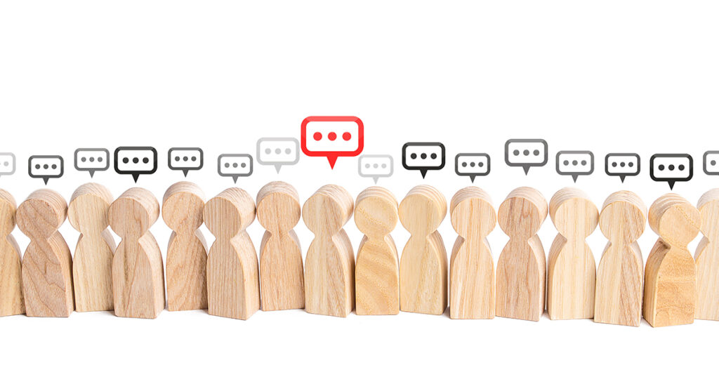 Wooden collection of people like figures.